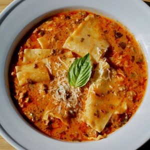 bowl of lasagna soup with basil 