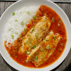 a bowl of fish creole